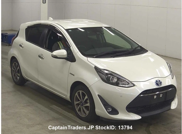 2019 Toyota Aqua - photo 1 2019 Toyota Aqua Pearl Sedan for sale, Japanese used car export | GULJI TRADERS