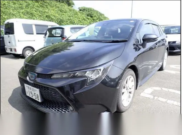 2022 Toyota Corolla Touring Push Start Hybrid S - photo 1 2022 Toyota Corolla Touring Push Start Hybrid S Black Sedan for sale, Japanese used car export | GULJI TRADERS