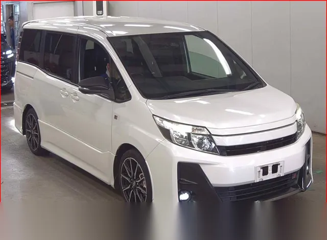 2018 Toyota Noah Push Start Si Gr Sports - photo 1 2018 Toyota Noah Push Start Si Gr Sports Pearl white Van for sale, Japanese used car export | GULJI TRADERS